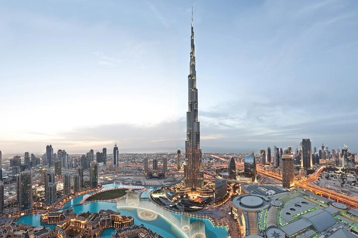 Experience iconic landmarks like the Burj Khalifa and Dubai Marina savor local flavors at Souk Al Bahar and witness a stunning fountain show in the heart of this remarkable city.